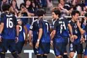 亚洲霸主能否再创辉煌？日本队5-0横扫巴林，国足能否借东风突围？