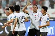 亚洲霸主能否再创辉煌？日本队5-0横扫巴林，国足能否借东风突围？
